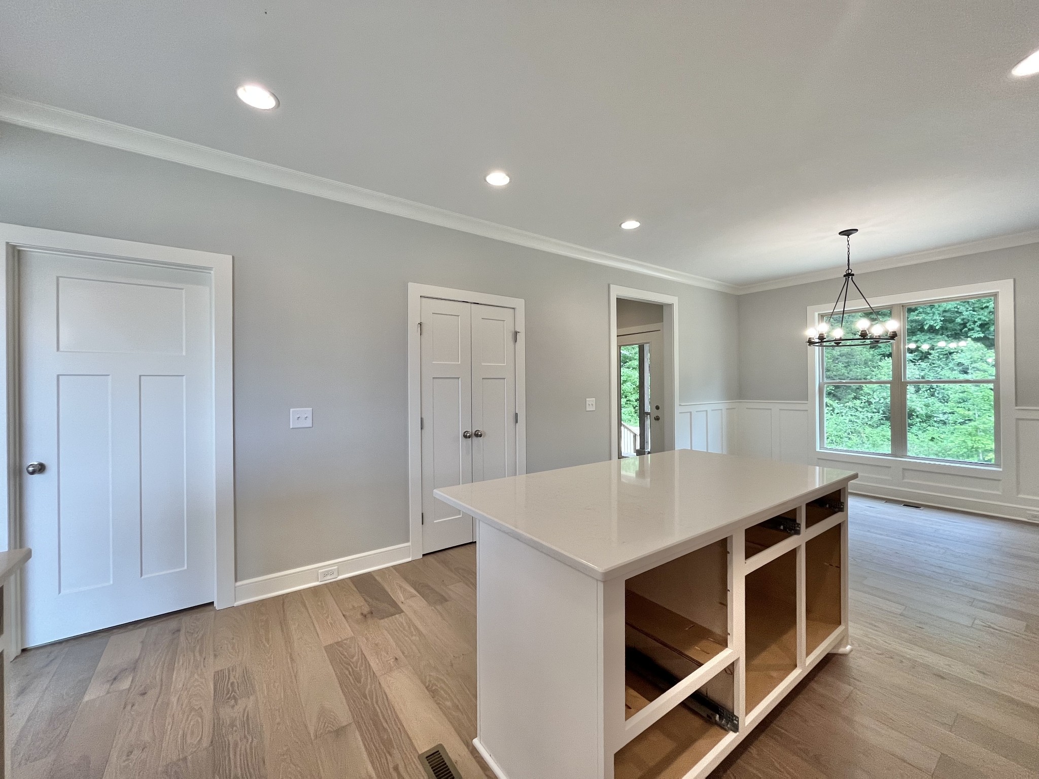 808 Ridgestone Place, Unit 105C Lebanon, TN 37087 - Photo 9 of 25 a kitchen with a stove and a wooden floors