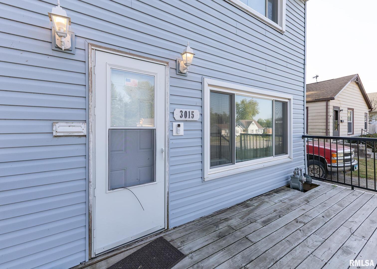 3015 North 3rd Street Clinton, IA 52732 - Photo 2 of 28 a view of a house with a patio