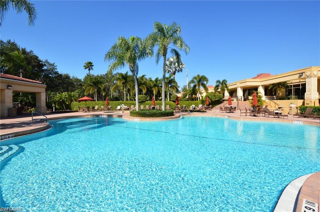 580 El Camino Real, Unit 3402 Naples, FL 34119 - Photo 18 of 35 a view of a park with swings and slides