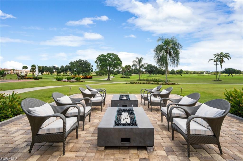 580 El Camino Real, Unit 3402 Naples, FL 34119 - Photo 21 of 35 a view of a sitting area with furniture and garden