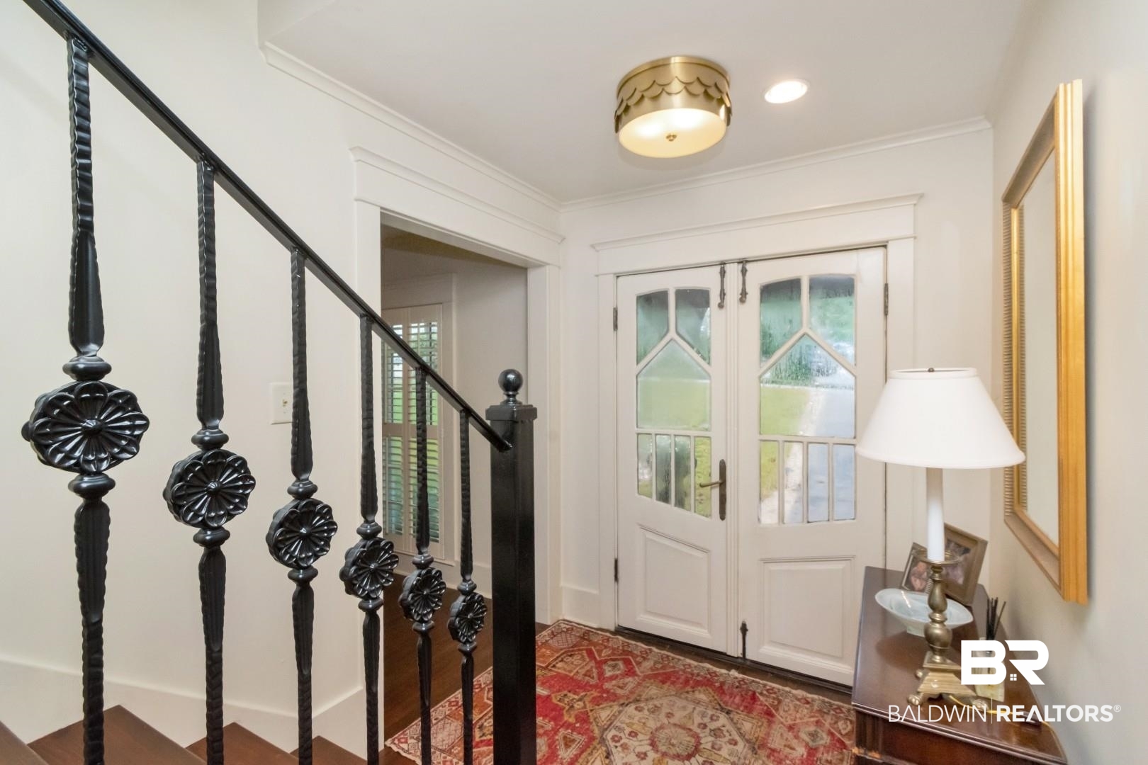 4810 Mums Court Mobile, AL 36608 - Photo 16 of 50 Entrance foyer with french doors, crown molding, light wood-style flooring, and stairway