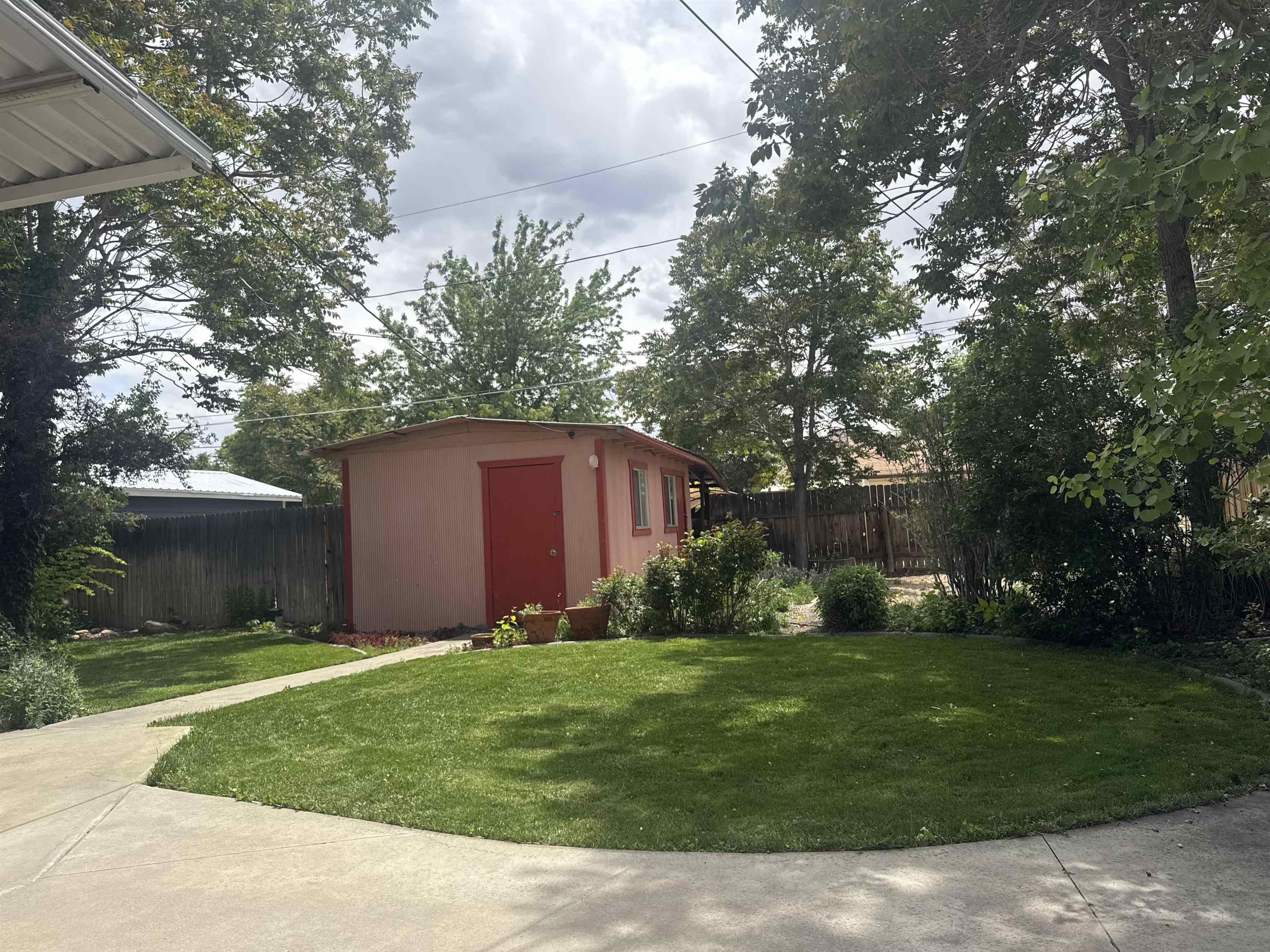 435 West 4th Street Palisade, CO 81526 - Photo 21 of 28 a view of a back yard with green space