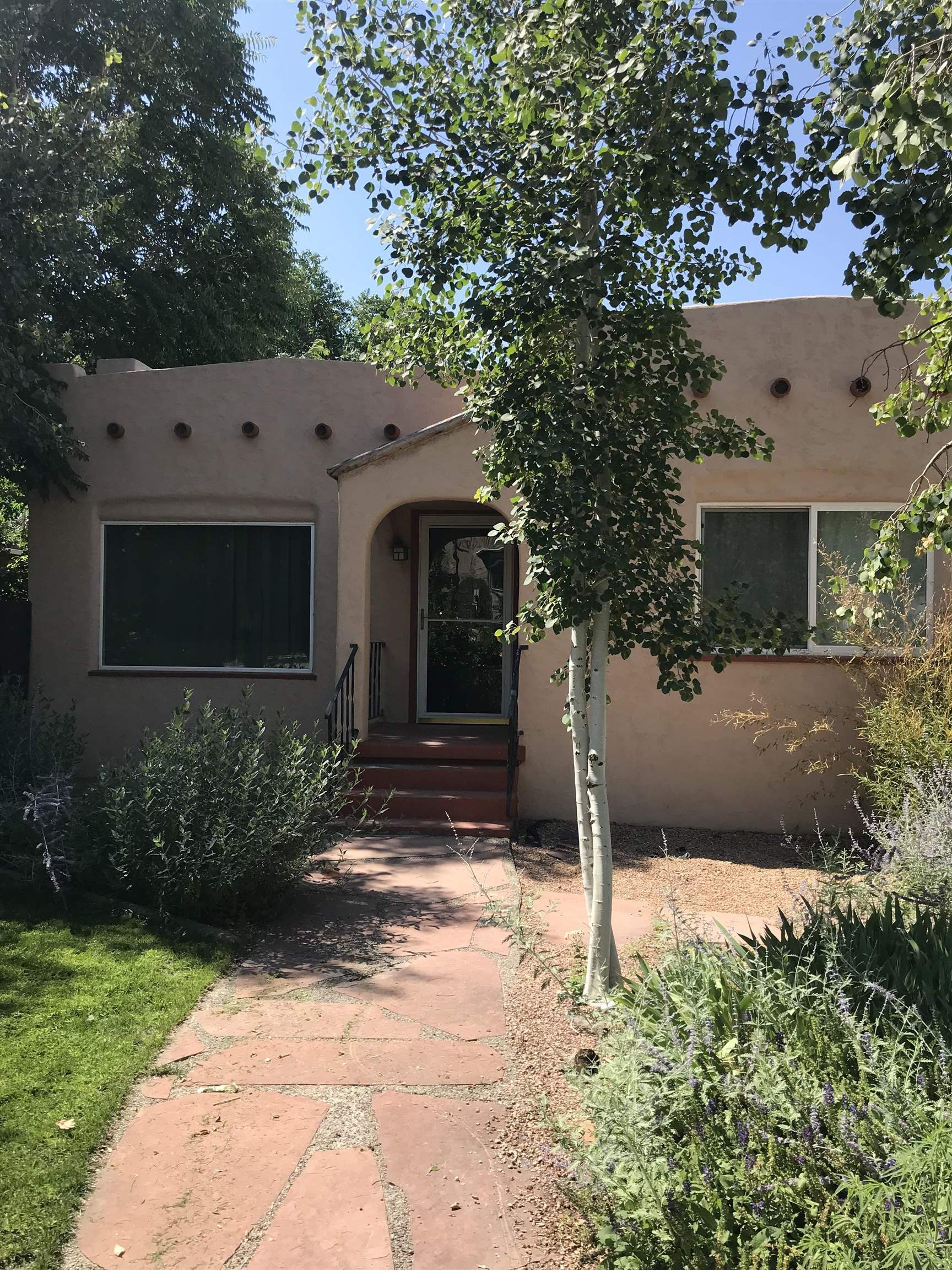 435 West 4th Street Palisade, CO 81526 - Photo 26 of 28 a front view of a house with garden
