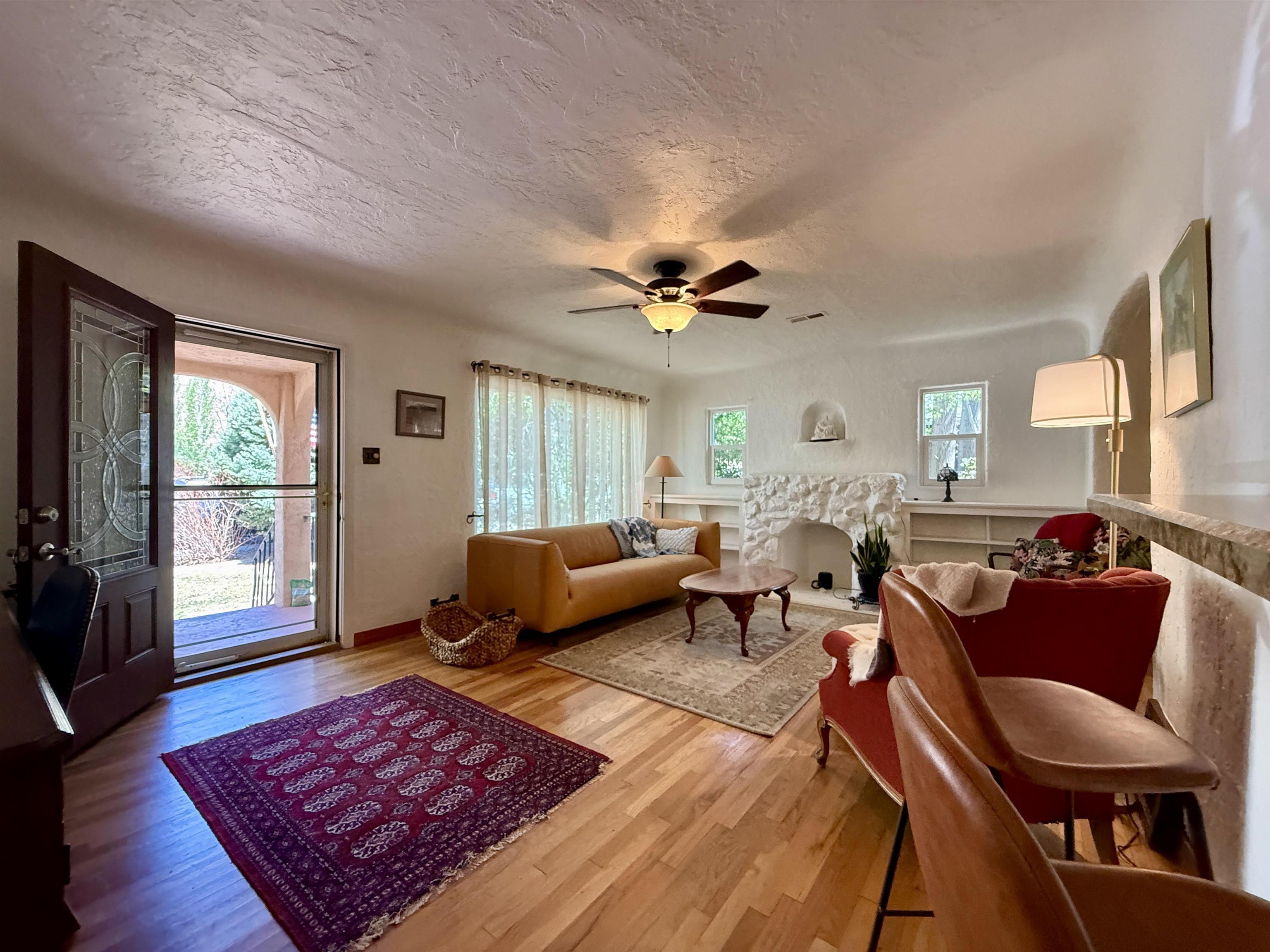 435 West 4th Street Palisade, CO 81526 - Photo 5 of 28 a living room with furniture rug and window