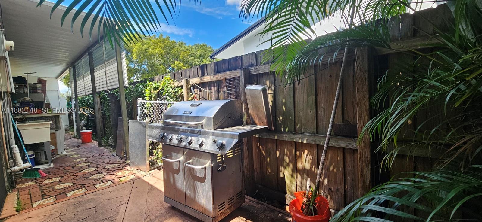 243 Northwest 62nd Court Miami, FL 33126 - Photo 6 of 19 a view of outdoor space and deck
