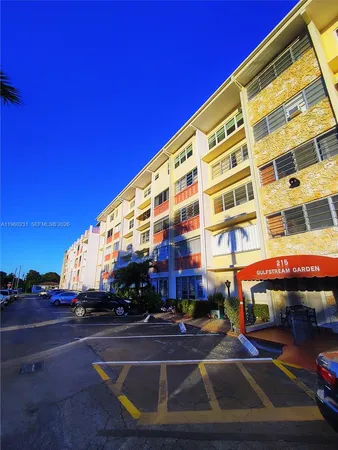 a front view of a building with glass windows
