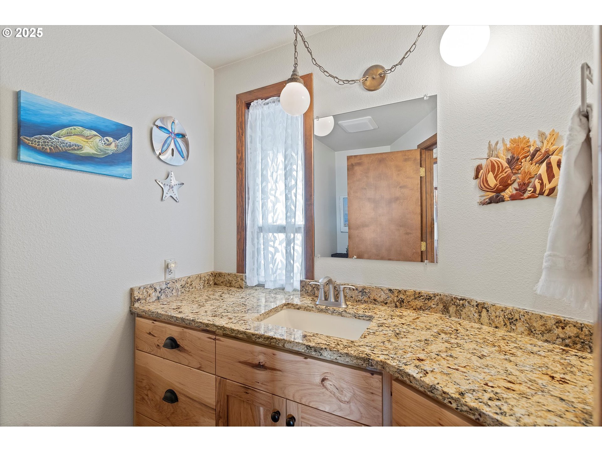 21560 Gooseneck Road Sheridan, OR 97378 - Photo 15 of 48 a bathroom with a granite countertop sink mirror and a vanity