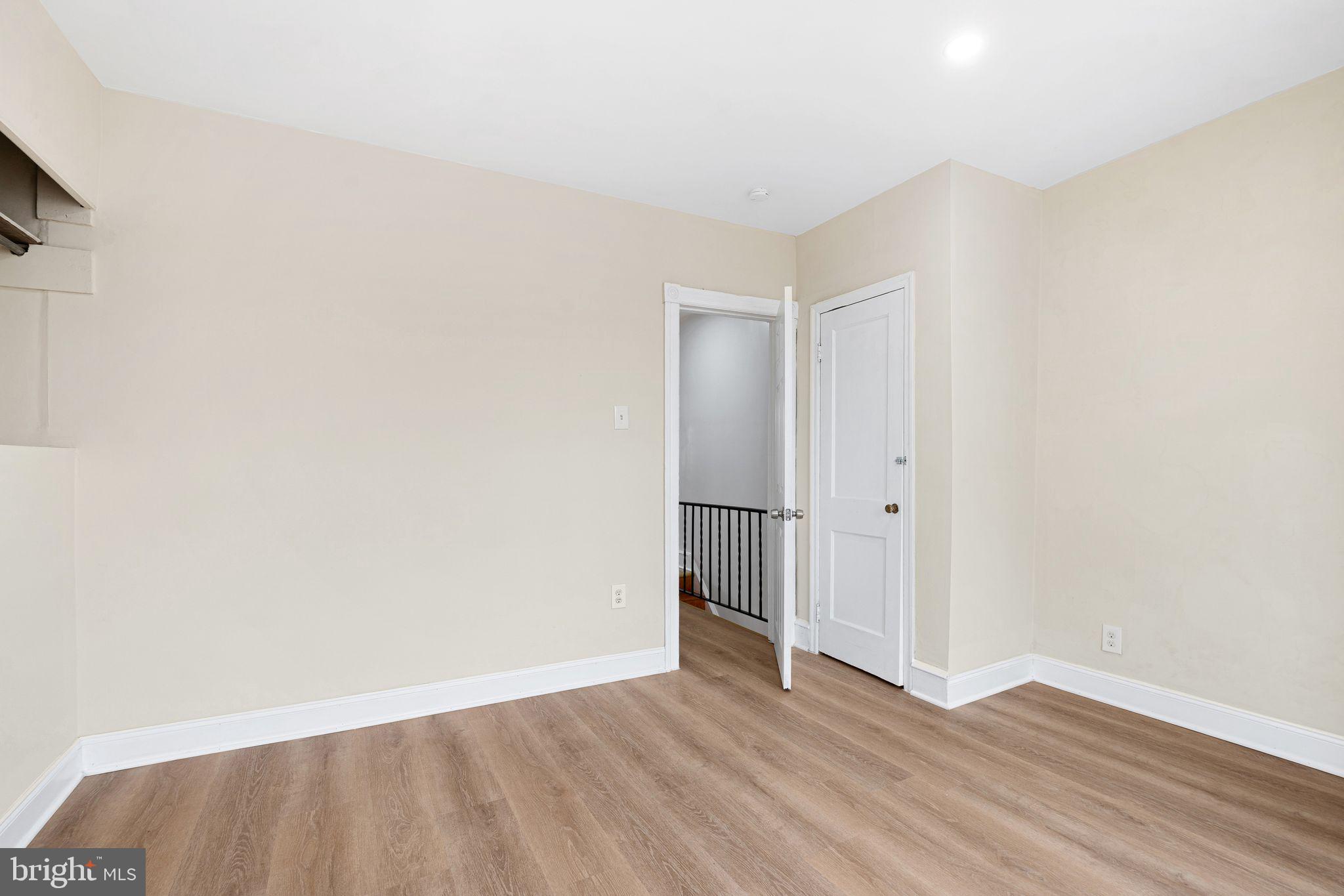 5428 Regent Street Philadelphia, PA 19143 - Photo 15 of 28 a view of wooden floor and windows in a room