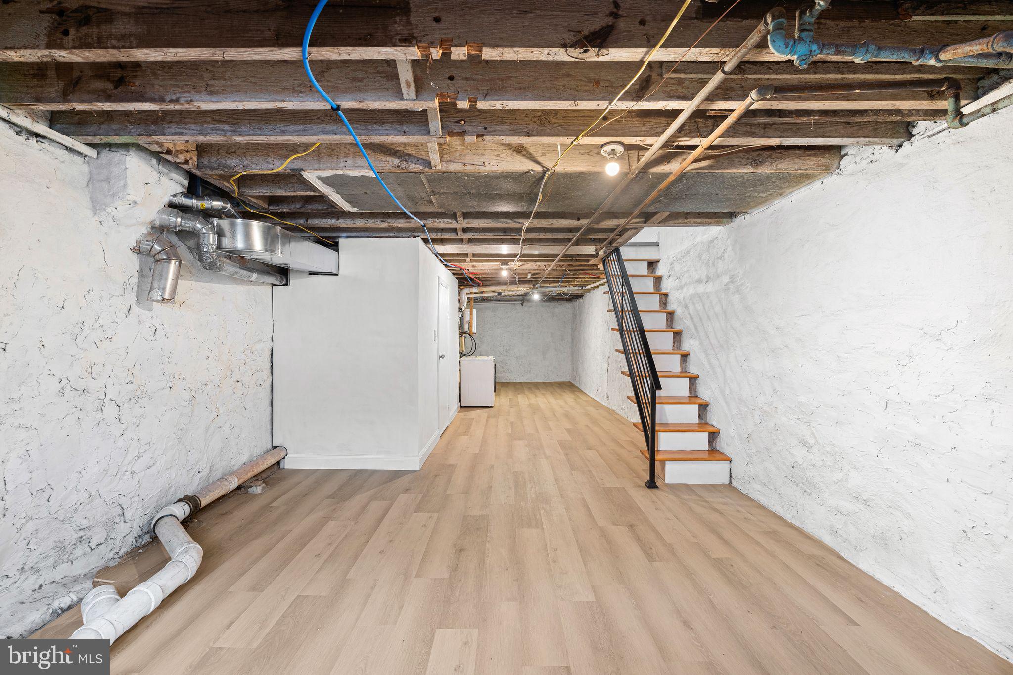 5428 Regent Street Philadelphia, PA 19143 - Photo 24 of 28 a view of a room with wooden floor