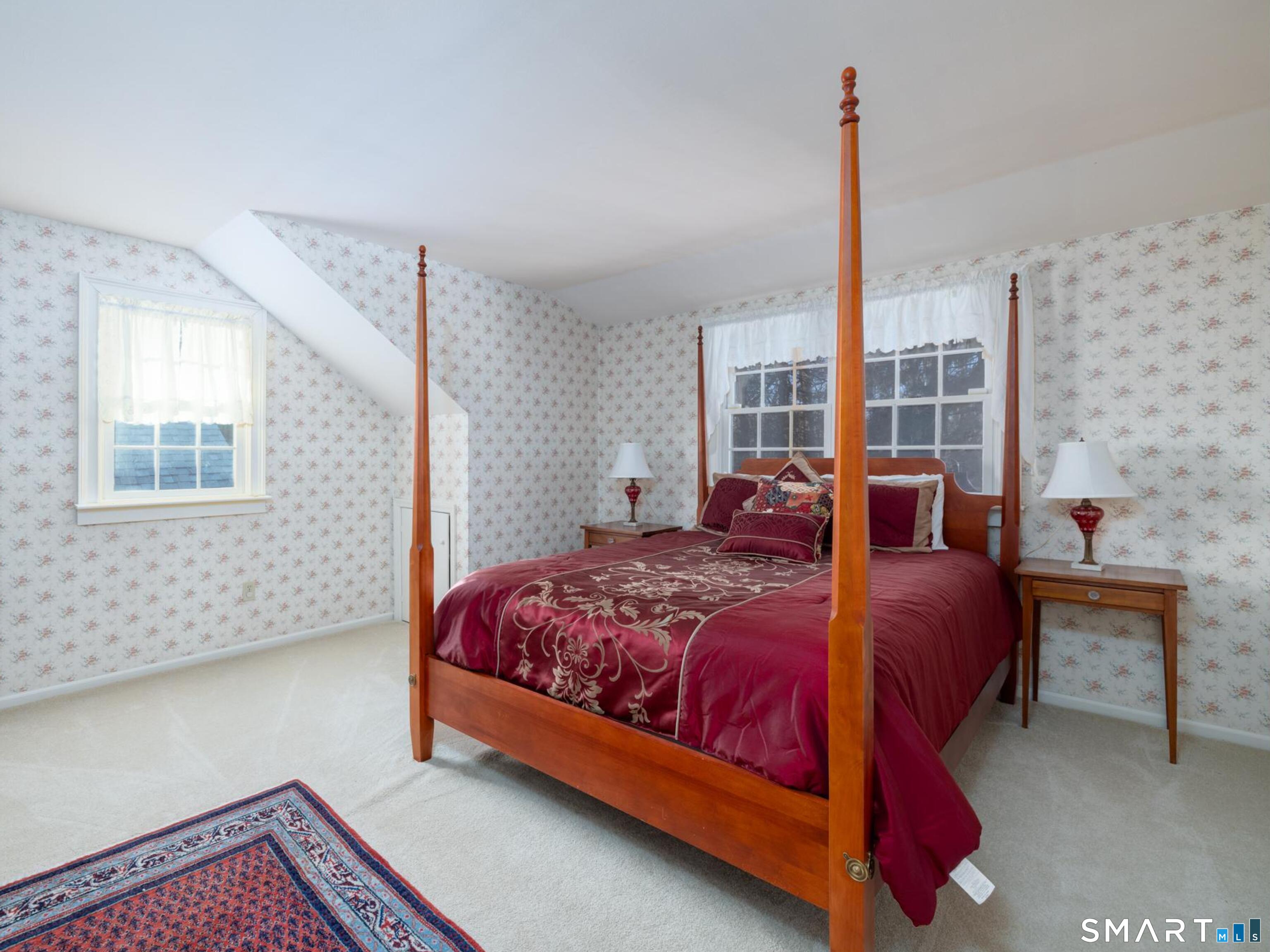 117 Crest Road Middlebury, CT 06762 - Photo 23 of 38 The upper level bedrooms have full height ceilings.