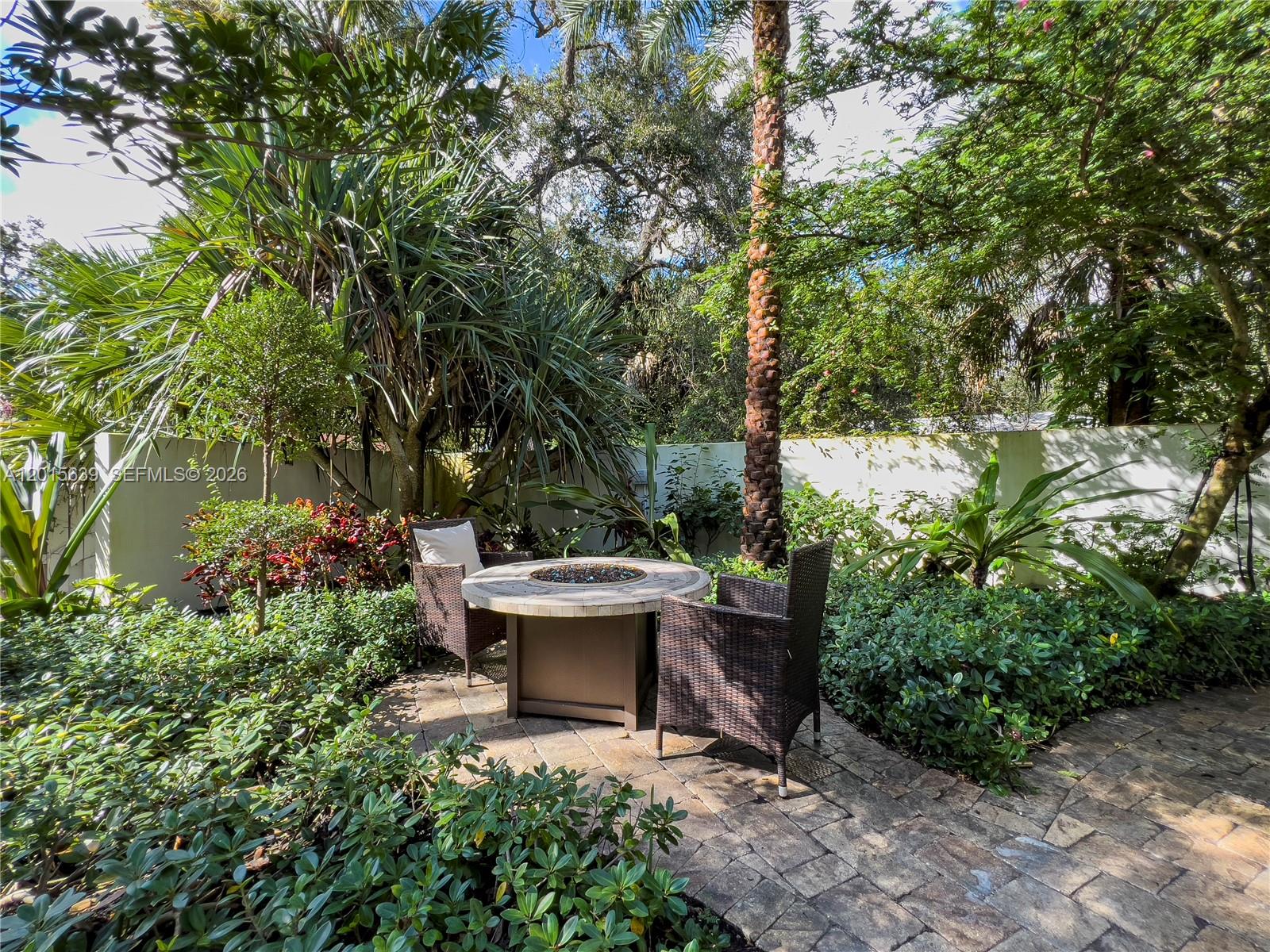 545 Southwest Indianola Street Stuart, FL 34994 - Photo 57 of 64 a view of a backyard with sitting area