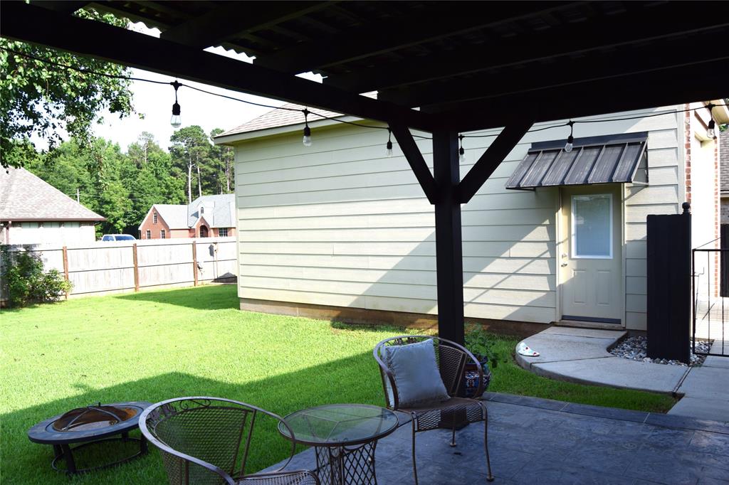 605 Jade Haughton, LA 71037 - Photo 24 of 34 Gazabeo covered,prettythick green grass, 10 x 30 shop on slab with side entry