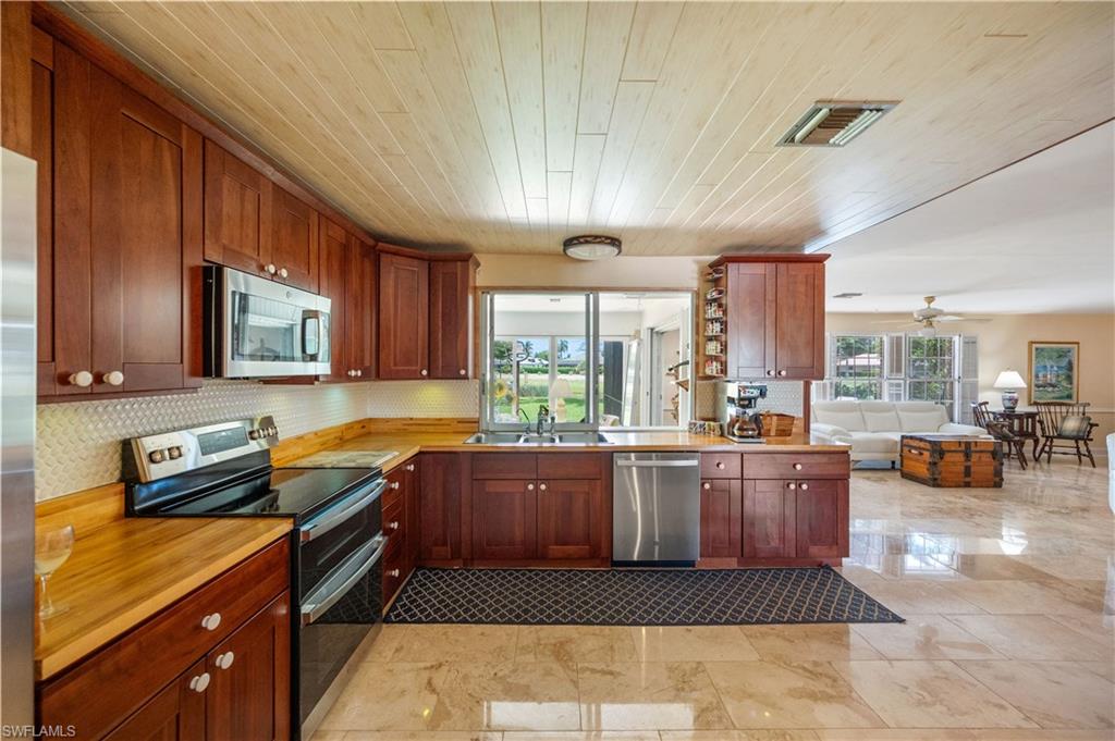 397 Forest Hills Boulevard Naples, FL 34113 - Photo 29 of 29 Open kitchen floorplan.