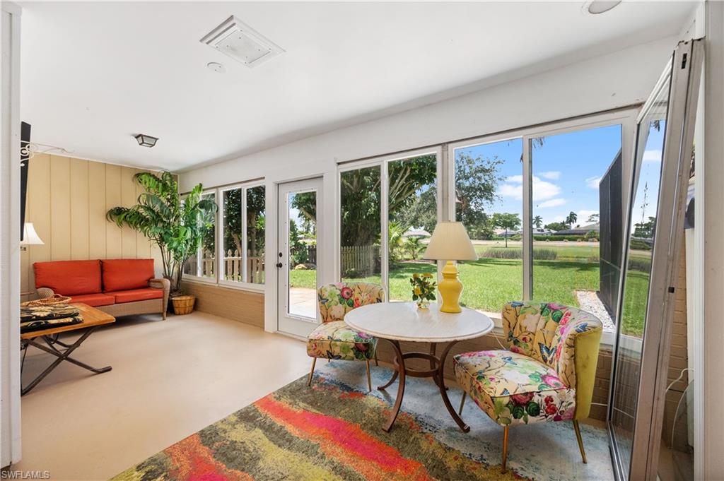 397 Forest Hills Boulevard Naples, FL 34113 - Photo 21 of 29 Air conditioned sun room.