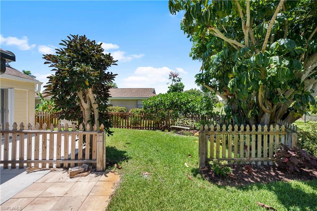 397 Forest Hills Boulevard Naples, FL 34113 - Photo 28 of 29 Part of backyard that is fenced in for a dog area.