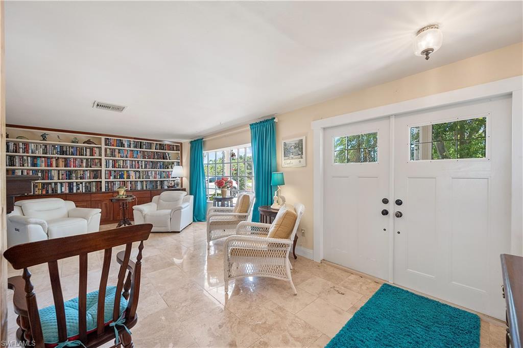 397 Forest Hills Boulevard Naples, FL 34113 - Photo 3 of 29 Double front doors into home.