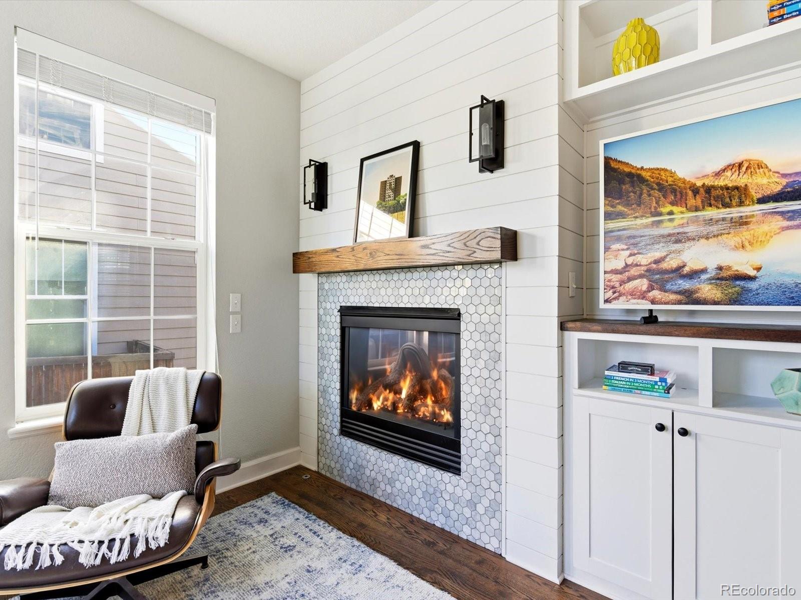 2691 Spruce Street Denver, CO 80238 - Photo 14 of 36 a living room with furniture and a fireplace
