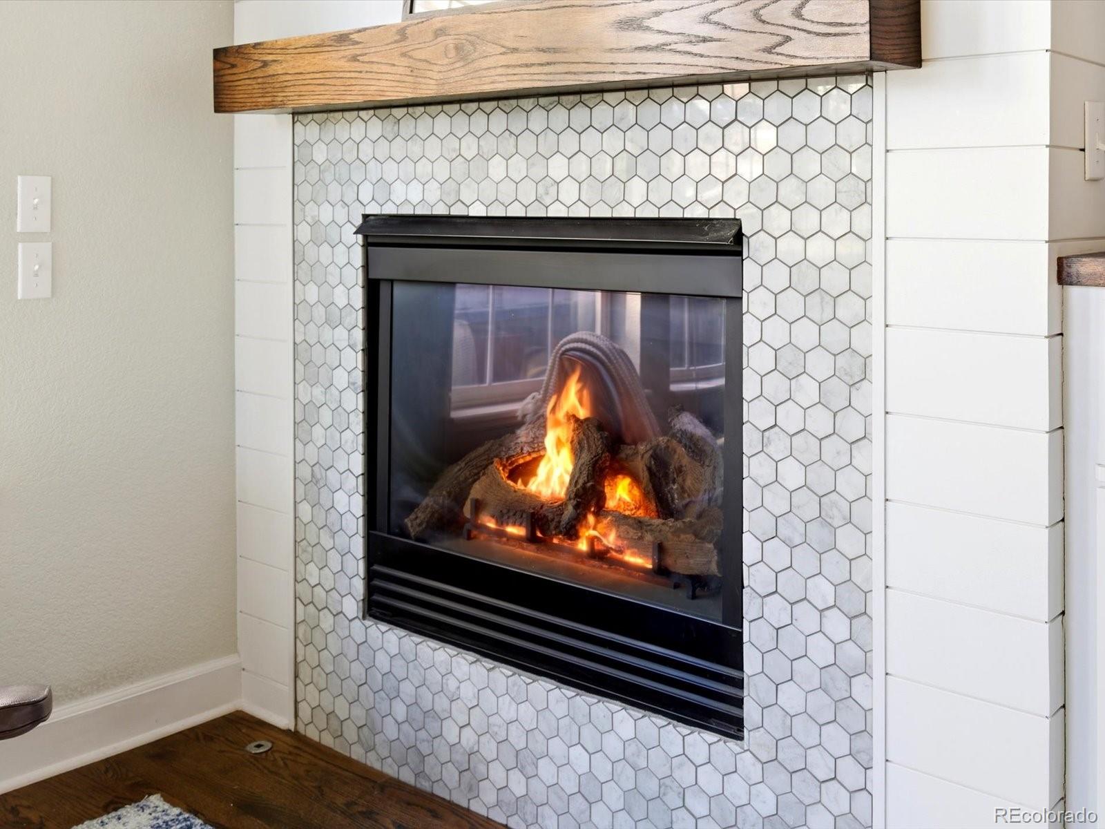 2691 Spruce Street Denver, CO 80238 - Photo 15 of 36 a living room with a fireplace