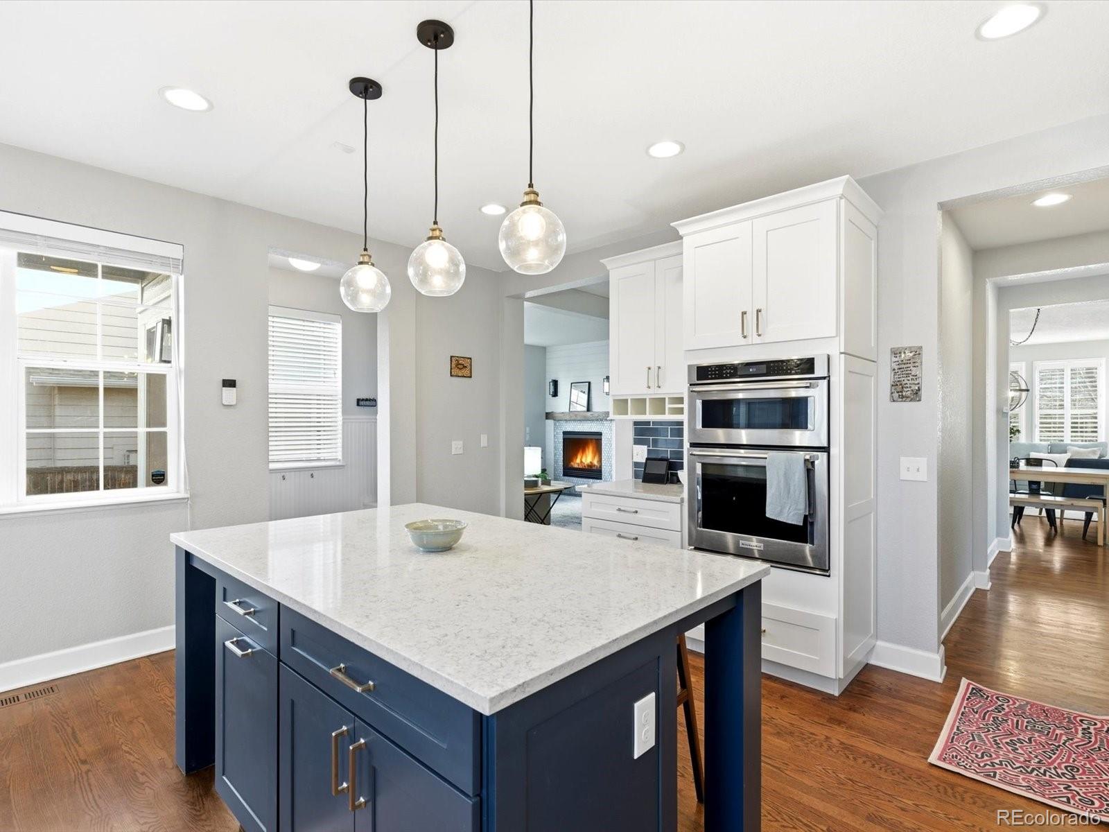 2691 Spruce Street Denver, CO 80238 - Photo 17 of 36 a kitchen with a table and chairs in it