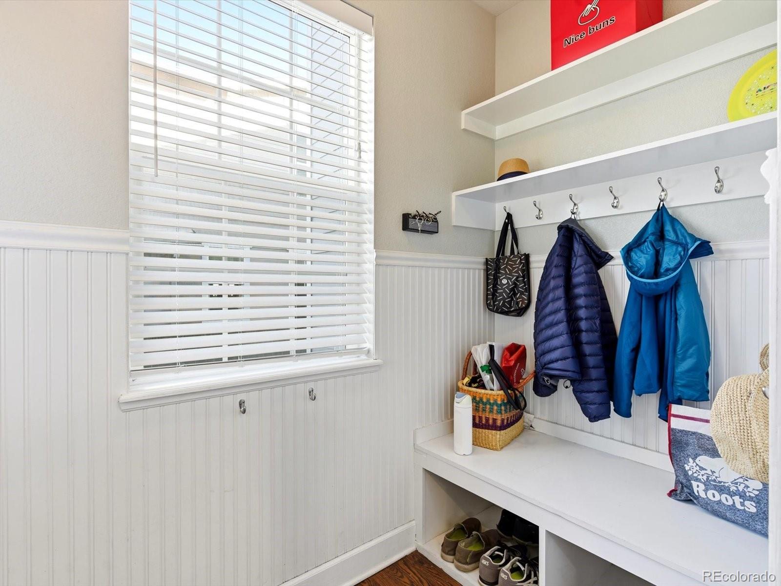 2691 Spruce Street Denver, CO 80238 - Photo 20 of 36 a view of walk in closet with clothes and shoes