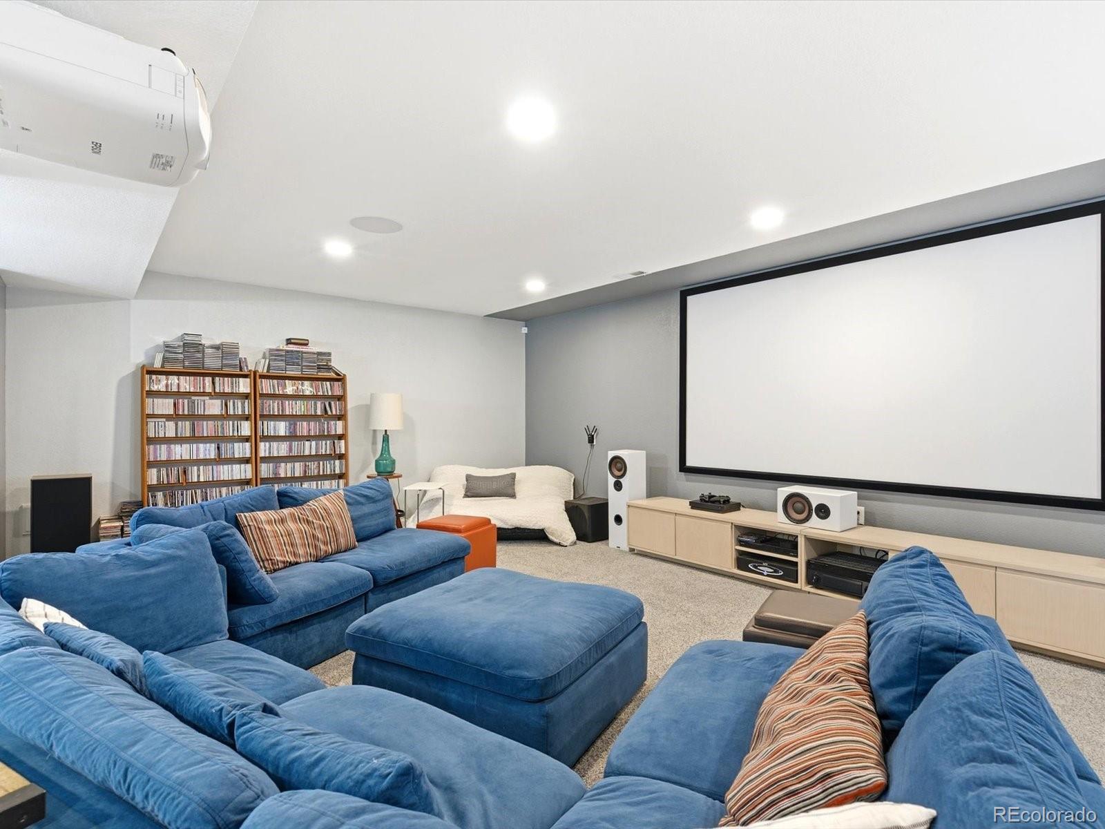 2691 Spruce Street Denver, CO 80238 - Photo 31 of 36 a living room with furniture and a flat screen tv