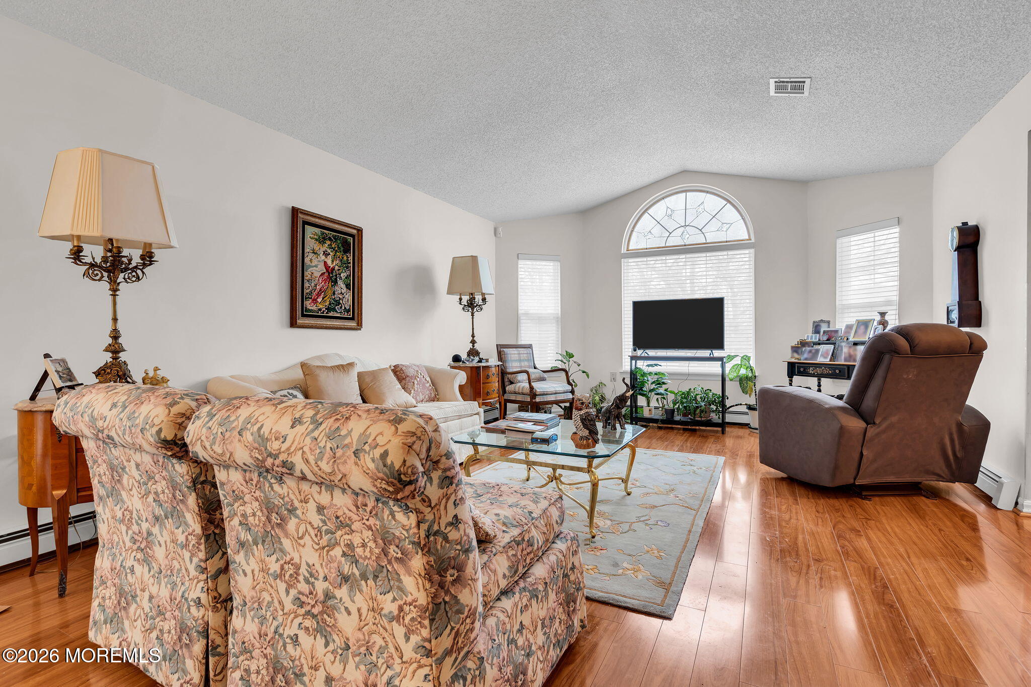 45 Winterton Drive Toms River, NJ 08757 - Photo 3 of 15 a living room with furniture fireplace and a window