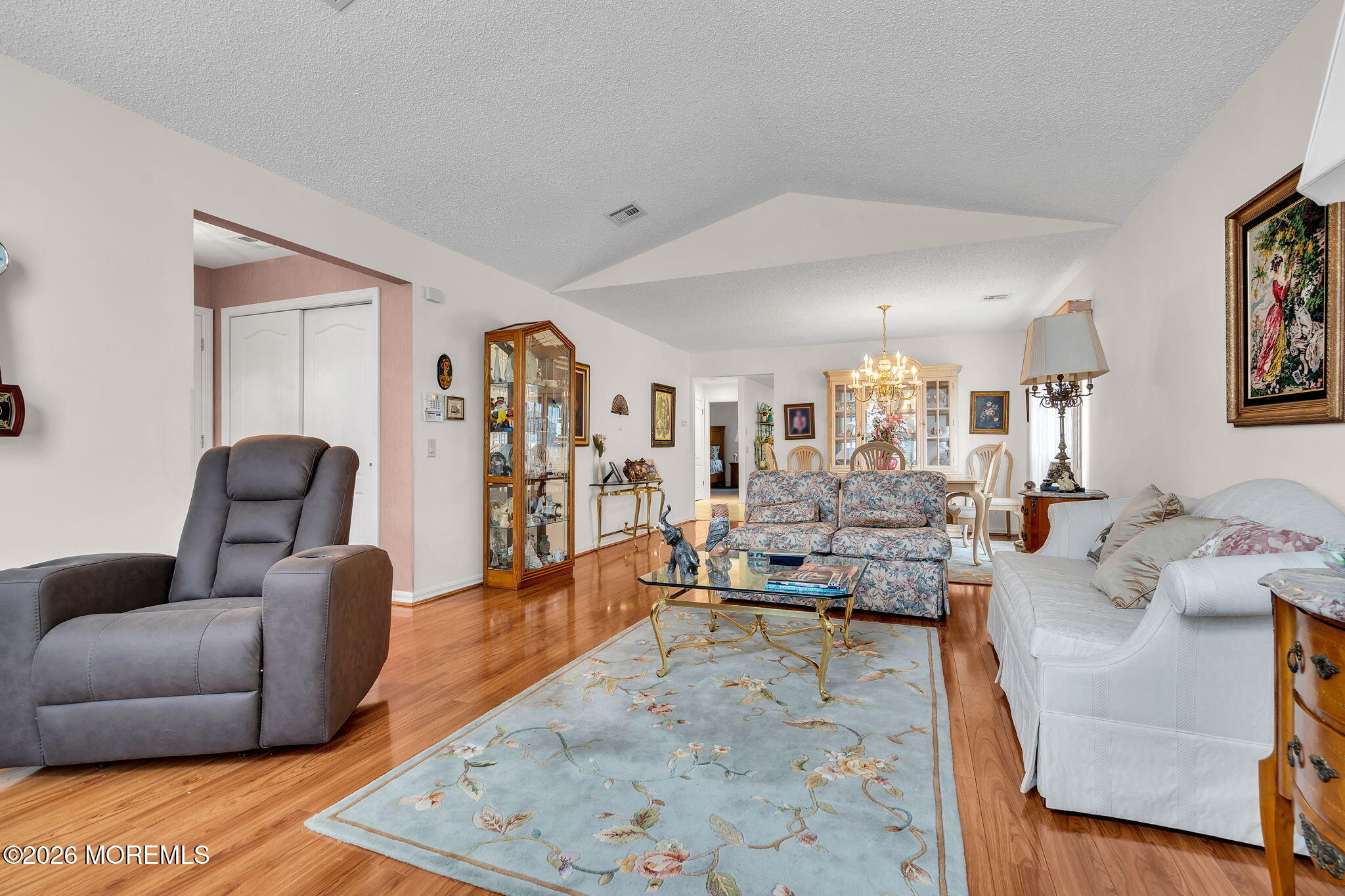 45 Winterton Drive Toms River, NJ 08757 - Photo 4 of 15 a living room with furniture and wooden floor