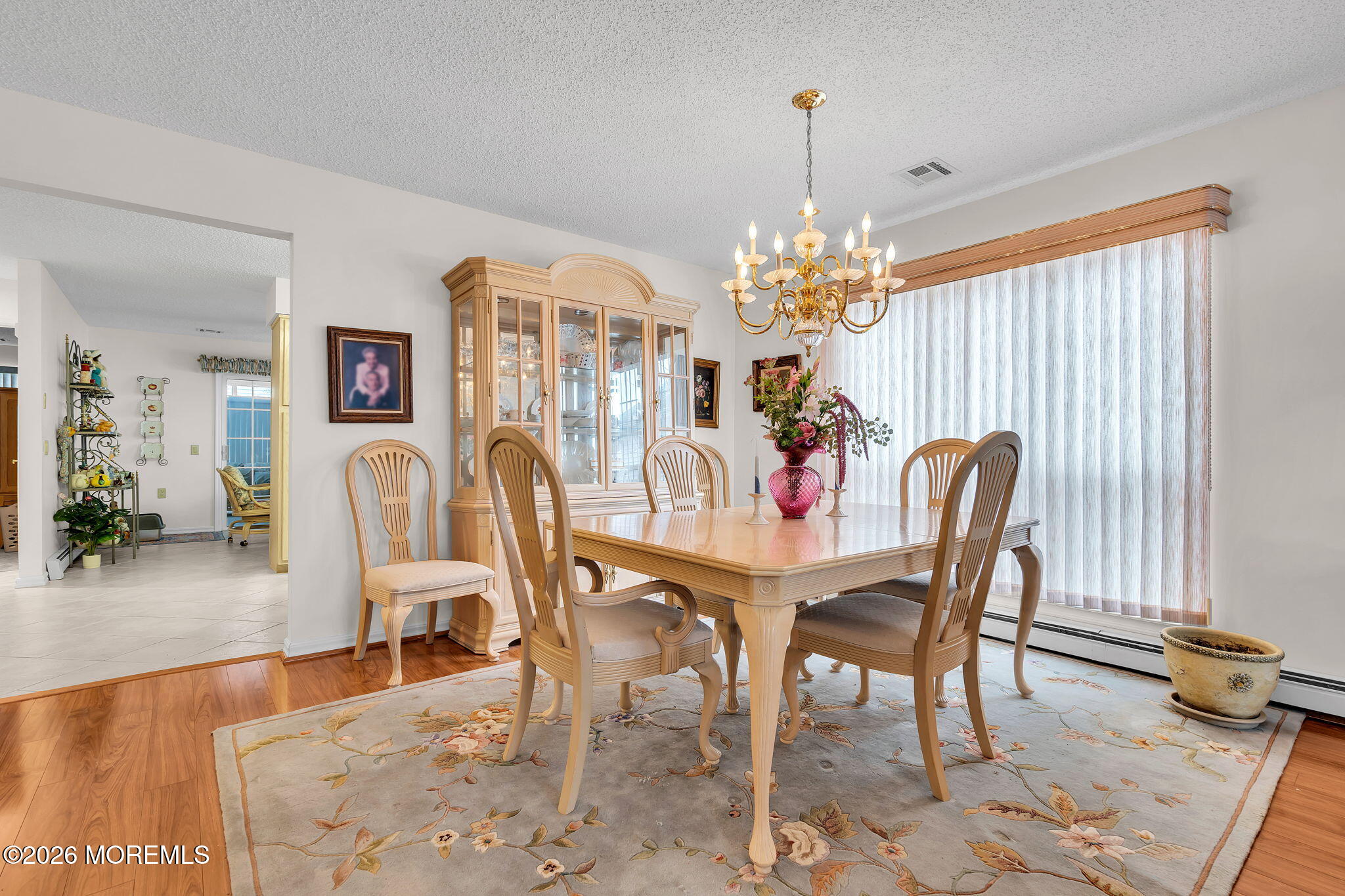 45 Winterton Drive Toms River, NJ 08757 - Photo 5 of 15 a view of a dining room with furniture and chandelier