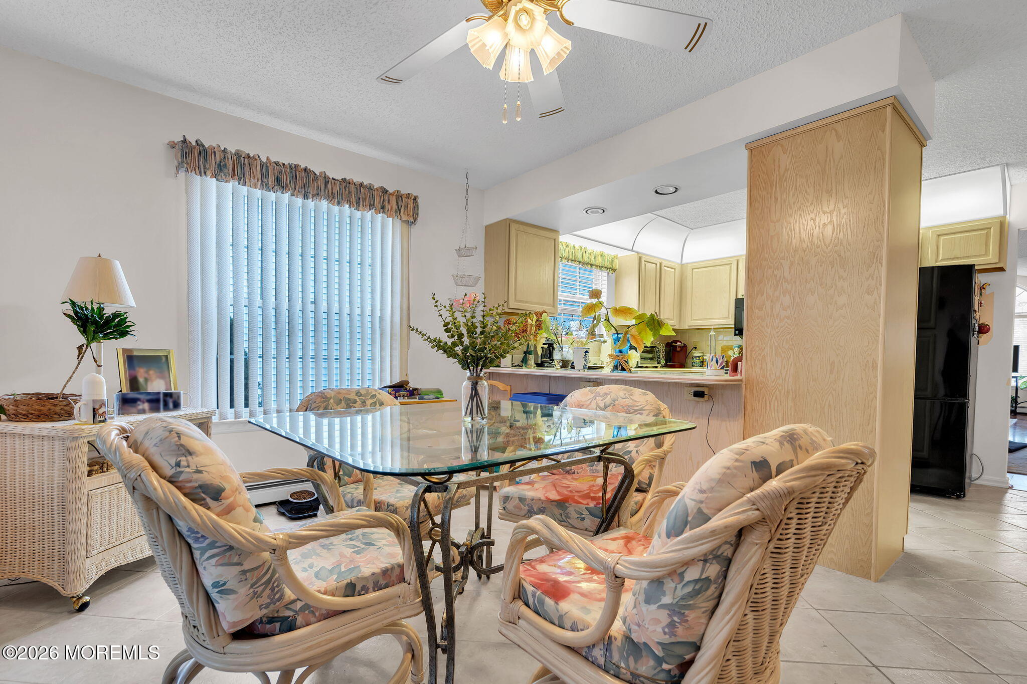 45 Winterton Drive Toms River, NJ 08757 - Photo 8 of 15 a dining room with furniture and a chandelier