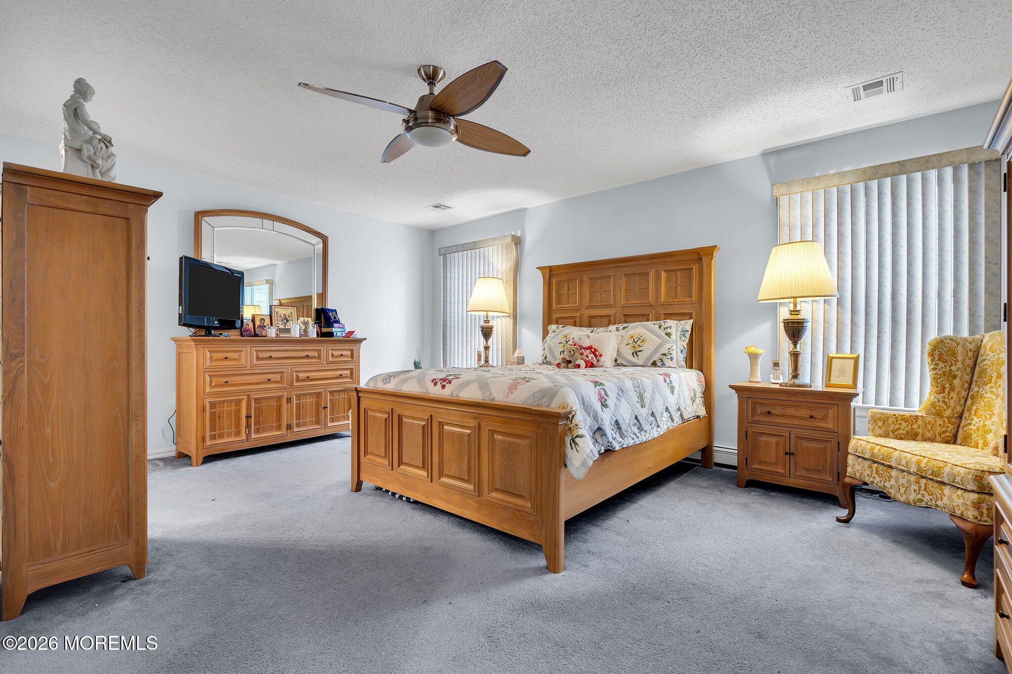 45 Winterton Drive Toms River, NJ 08757 - Photo 10 of 15 a bedroom with a bed and a couch