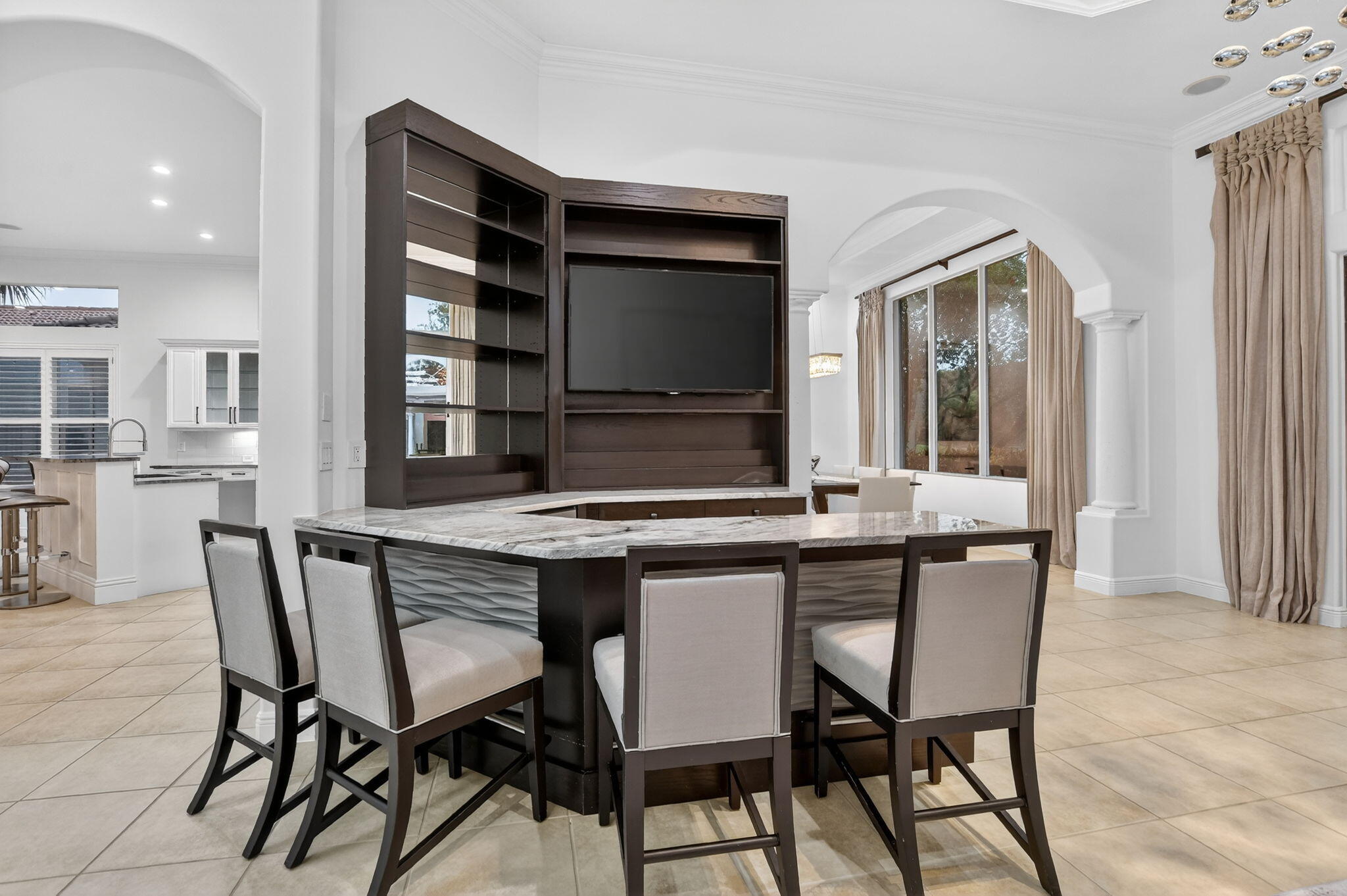 8030 Laurel Ridge Court Delray Beach, FL 33446 - Photo 15 of 87 a kitchen with a table and chairs in it