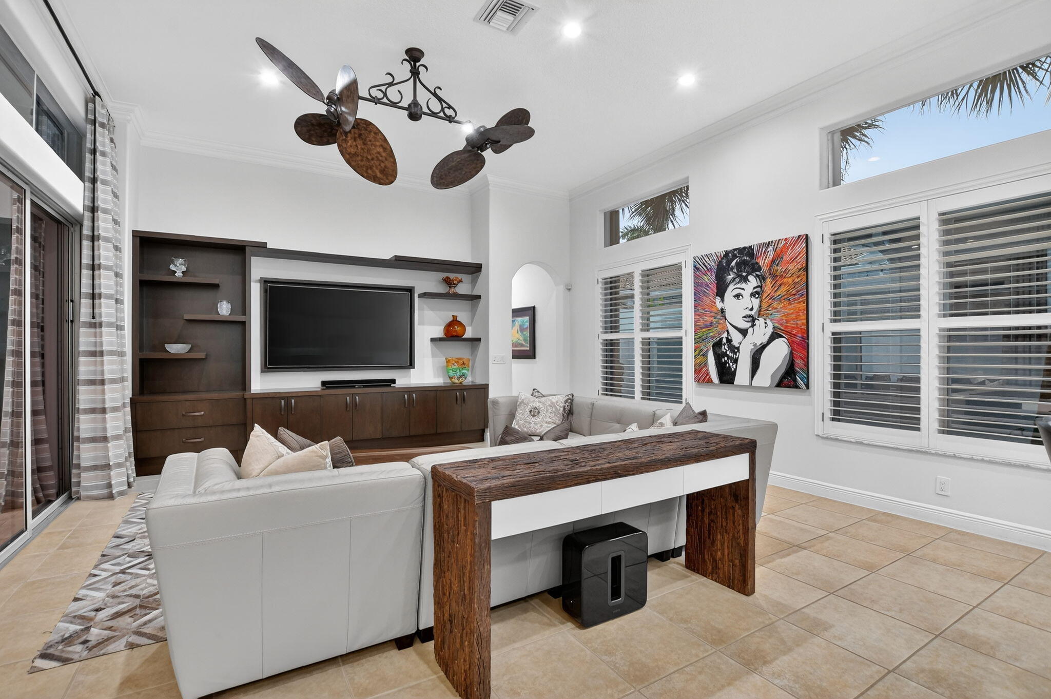 8030 Laurel Ridge Court Delray Beach, FL 33446 - Photo 32 of 87 a living room with furniture and a flat screen tv