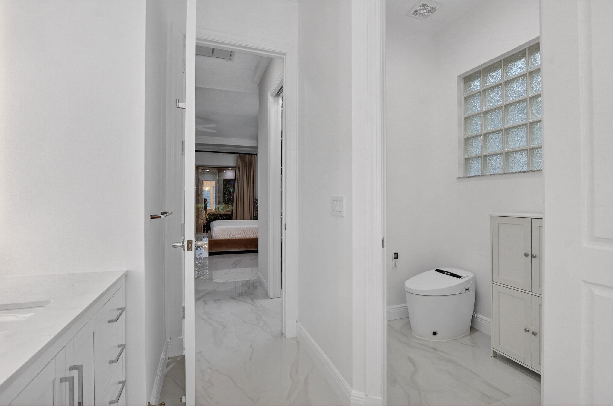 8030 Laurel Ridge Court Delray Beach, FL 33446 - Photo 47 of 87 a en suite bathroom with a toilet