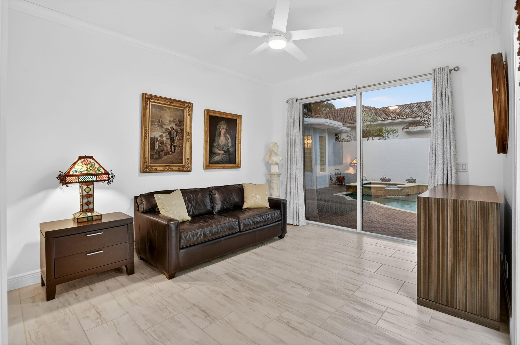 8030 Laurel Ridge Court Delray Beach, FL 33446 - Photo 50 of 87 a living room with furniture and a large window