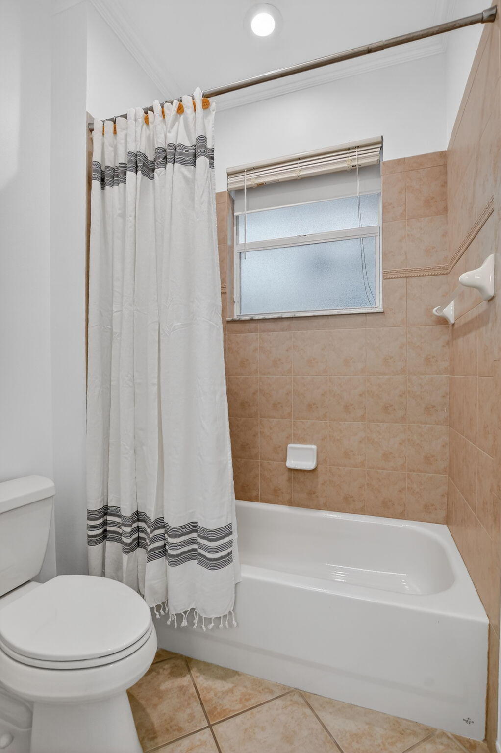 8030 Laurel Ridge Court Delray Beach, FL 33446 - Photo 54 of 87 a bathroom with a toilet a sink and bathtub