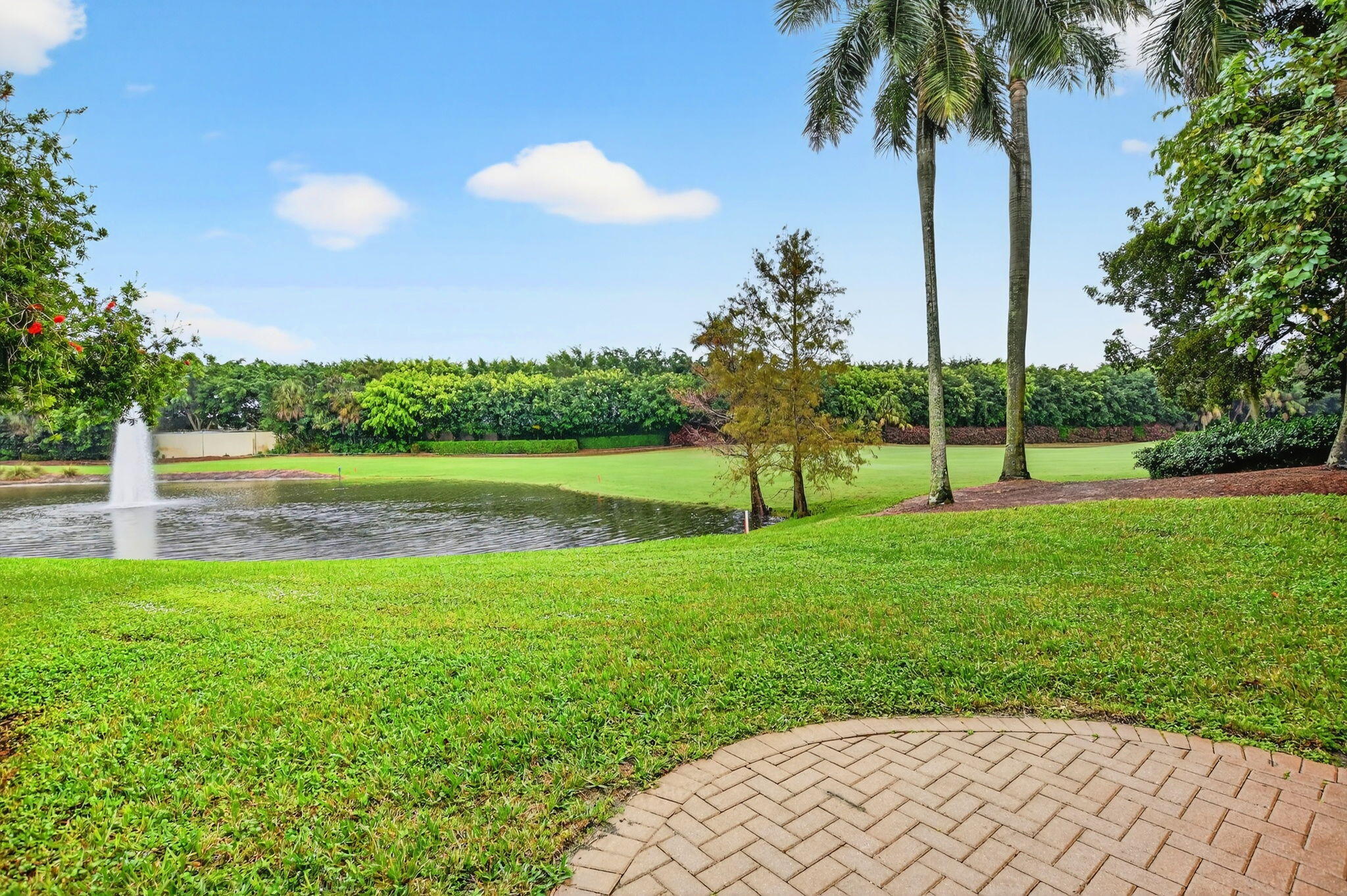 8030 Laurel Ridge Court Delray Beach, FL 33446 - Photo 65 of 87 Backyard Golf View