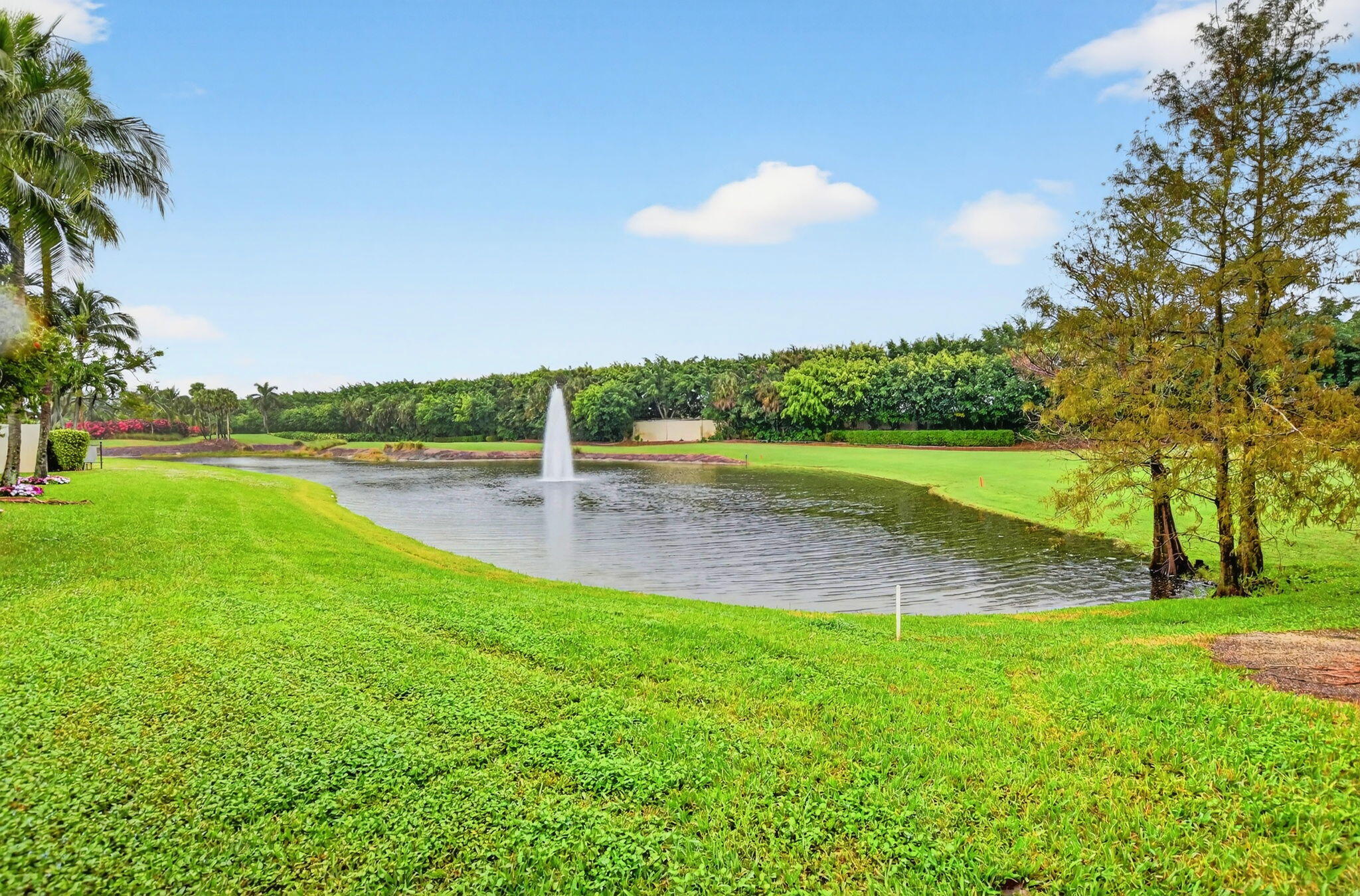 8030 Laurel Ridge Court Delray Beach, FL 33446 - Photo 68 of 87 Back of Home with lake/golf views