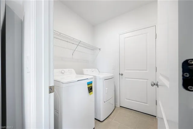 a bathroom with a granite countertop toilet a sink and a mirror