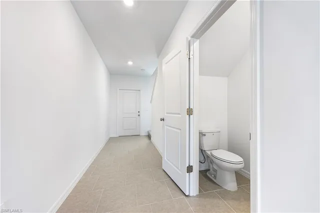 a view of hallway with stairs