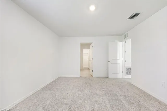 a bathroom with a toilet a sink and shower