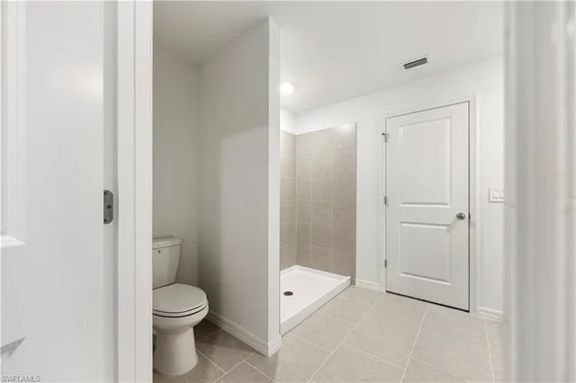 a bathroom with a double vanity sink and mirror