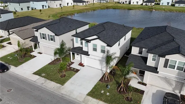 an aerial view of a house with a garden