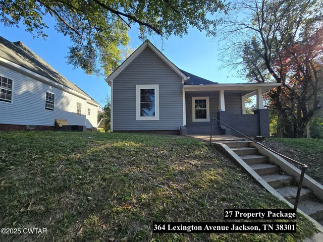 a house view with a garden space