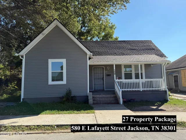 a view of house with outdoor space
