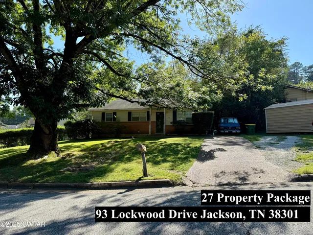 a view of swimming pool with a bench in front of house
