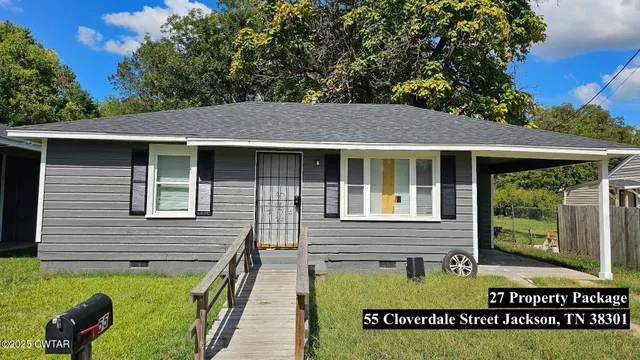 a view of house with backyard outdoor seating and mountain view