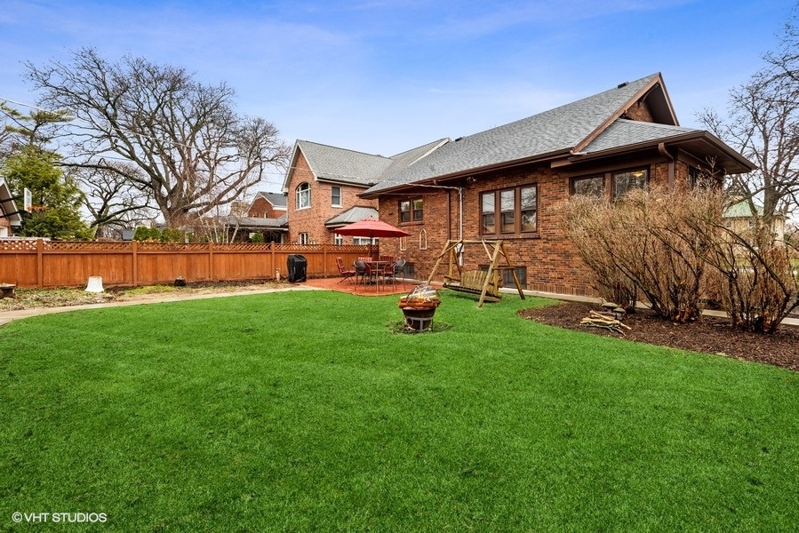 704 North Merrill Street Park Ridge, IL 60068 - Photo 34 of 37 a view of yard with green space and seating area