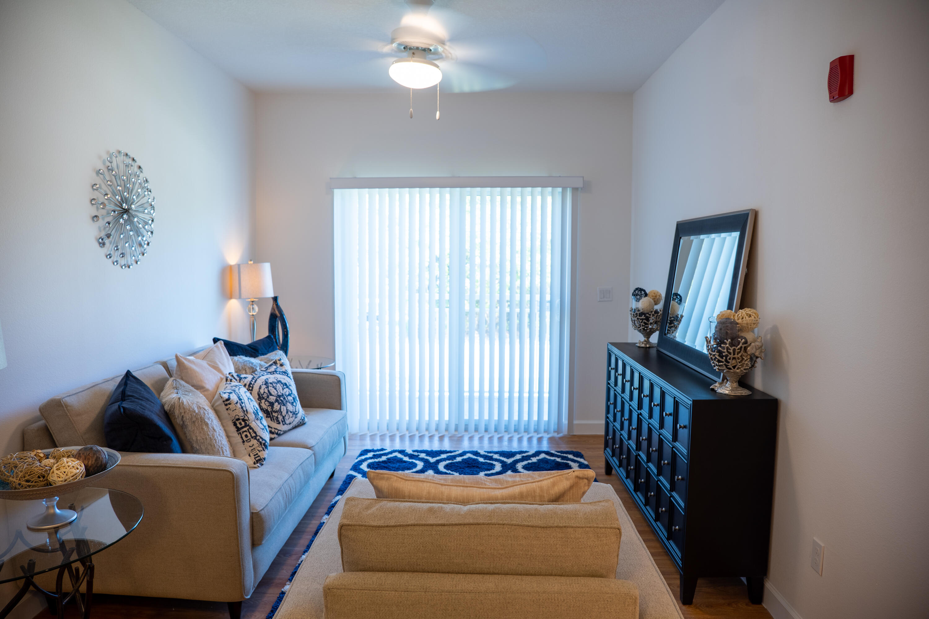 1553 Florida Mango Road, Unit 303 Palm Springs, FL 33406 - Photo 3 of 5 a bedroom with furniture and a window