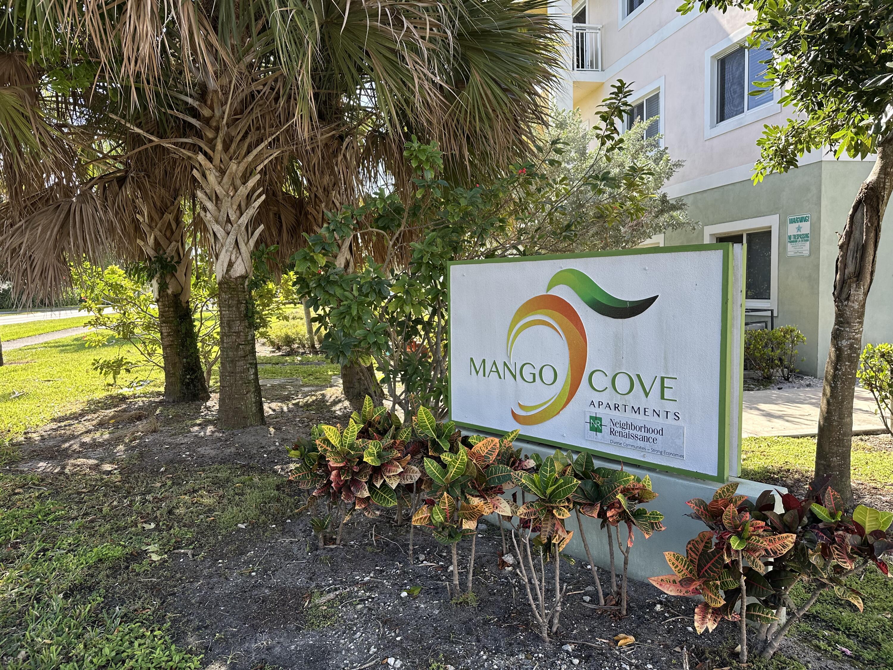 1553 Florida Mango Road, Unit 303 Palm Springs, FL 33406 - Photo 5 of 5 a view of a sign board