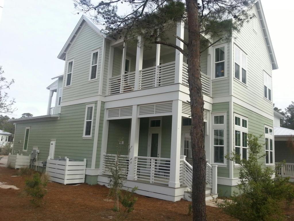 158 Clipper Street, Unit 85 Inlet Beach, FL 32461 - Photo 1 of 12 a front view of a house with a garage